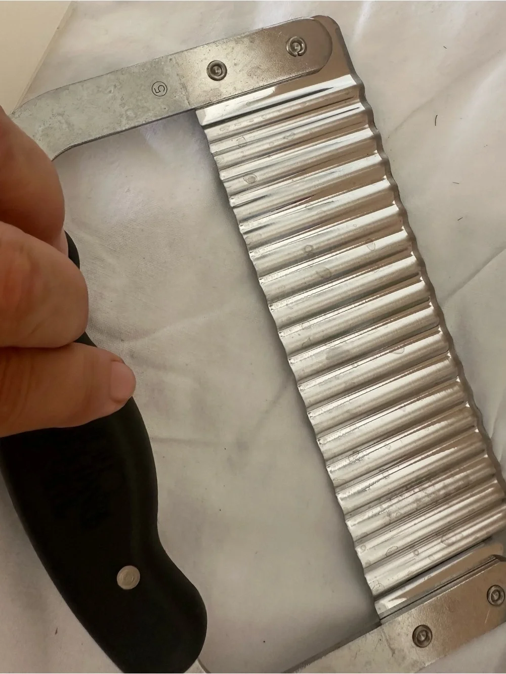 The Pampered Chef Black Hand Grip Handle with Stainless Accents